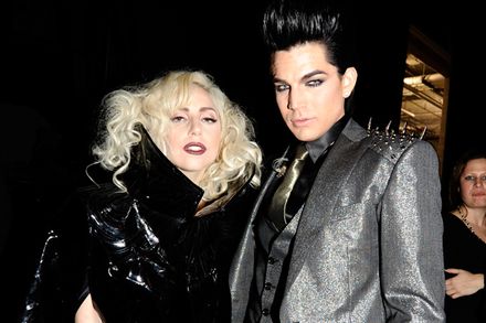 Adam and Lady Gaga posing for a picture.